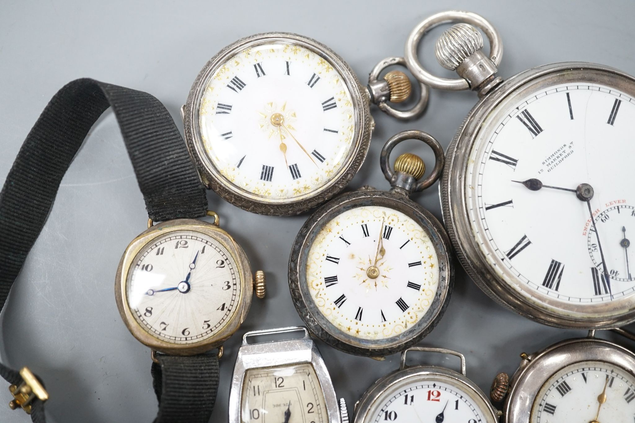 A George V silver open faced pocket watch, two silver or white metal fob watches and nine assorted mainly early 20th century wrist watches including silver.